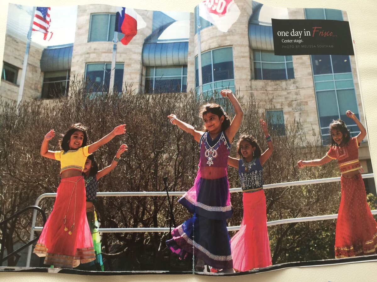 Aahana dancing on stage as a young child, featured in a Frisco community magazine spread